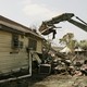 Members of the National Guard clear debris from the roads in New Orleans on September 15, 2005