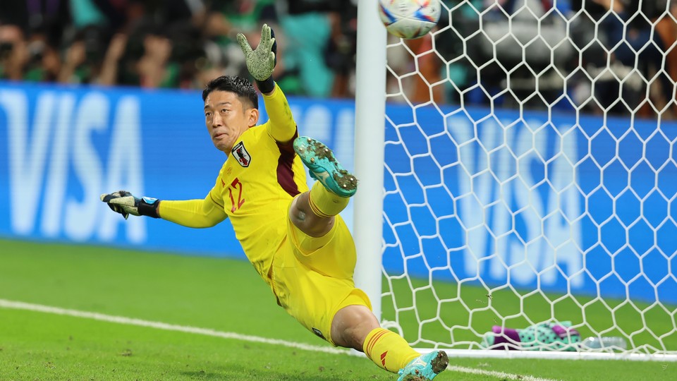 Japan's Shūichi Gonda attempts to block a Croatia penalty kick