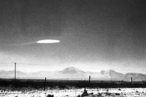 A photo of a UFO-shaped object in the sky