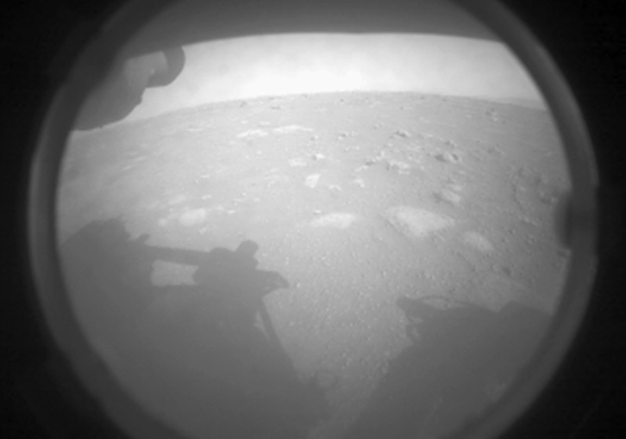 Martian rocks and dirt are visible in a dusty image made by the newest Mars rover.