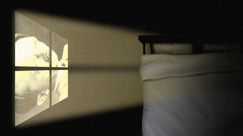 Photo illustration of an image of Hitler being projected onto a bed.