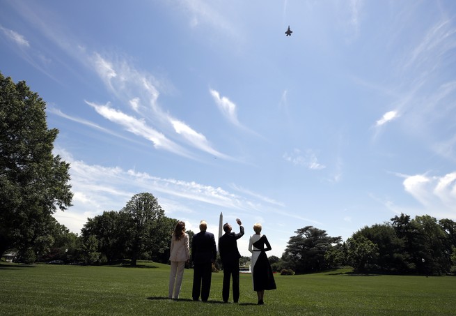 Donald Trump, Melania Trump, Andrzej Duda, and Agata Kornhauser-Duda watch a flyover of an F-35 Lightning II jet at the White House.