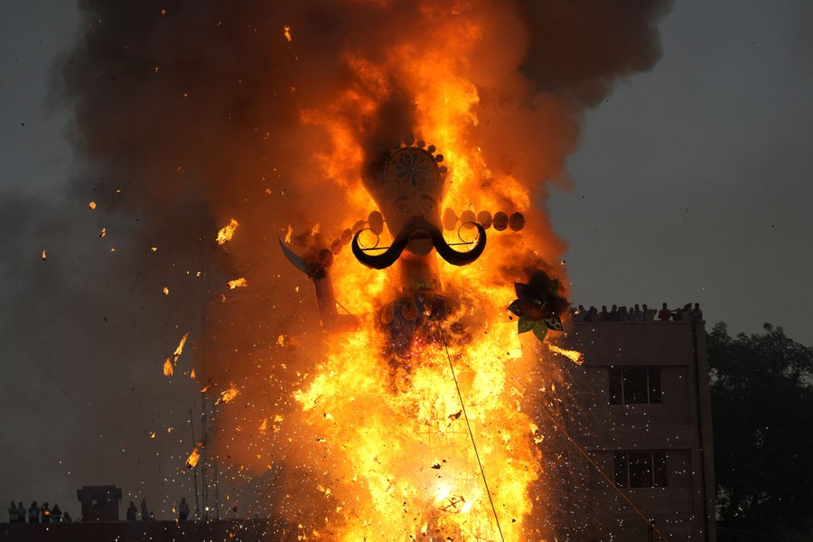 An effigy of a mythical demon king goes up in flames.
