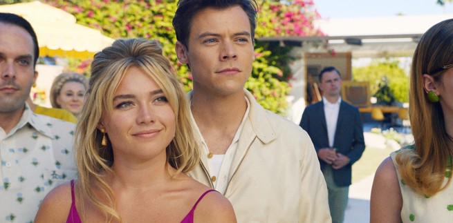 Florence Pugh and Harry Styles smiling softly in "Don't Worry Darling"