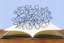 A blank open book with an illegible scribble floating above it