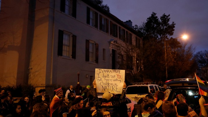 Protesters rally outside the home of Ivanka Trump on April 1, 2017.