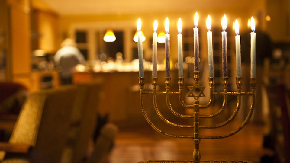 A lit Hanukkah menorah