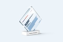 a trophy with a Publishers Marketplace deal report encased in crystal on a pedestal