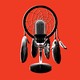 black-and-white podcasting microphone with dreamcatcher and feathers hanging from it on red background