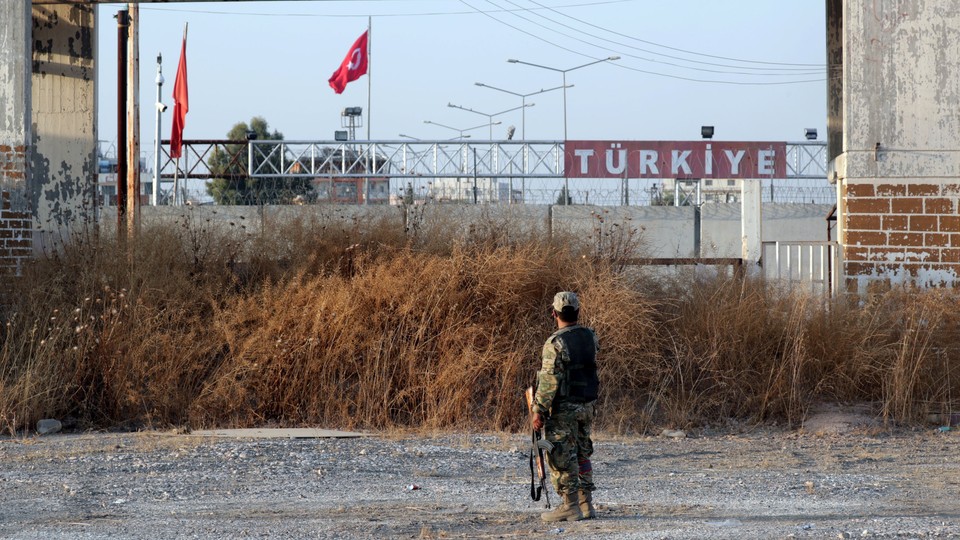 A Turkey-backed Syrian rebel fighter is seen in the town of Tal Abyad.