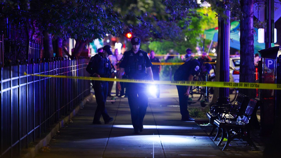 Police in Washington, D.C., investigate a shooting.