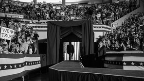 Trump walking onto a stage