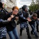 Riot police detain demonstrators during an anti-corruption protest organized by opposition leader Alexei Navalny in central Moscow, Russia, on June 12, 2017.