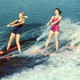 Photo of three women waterskiing in the 1950s