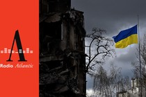 A photo splice of the black-and-white "Radio Atlantic" logo on a red background (on the left) and a photo of the Ukrainian flag in a damaged cityscape (on the right)