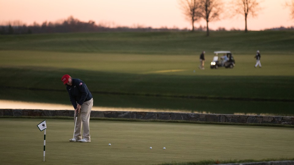 A man golfs at the Trump National Golf Club in Bedminster, New Jersey.