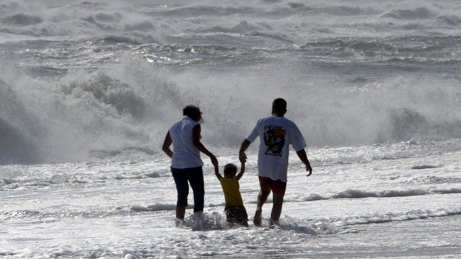 The cost of raising kids is making parents less happy