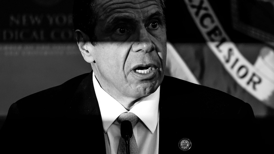 A black and white photo of Andrew Cuomo, looking surprised