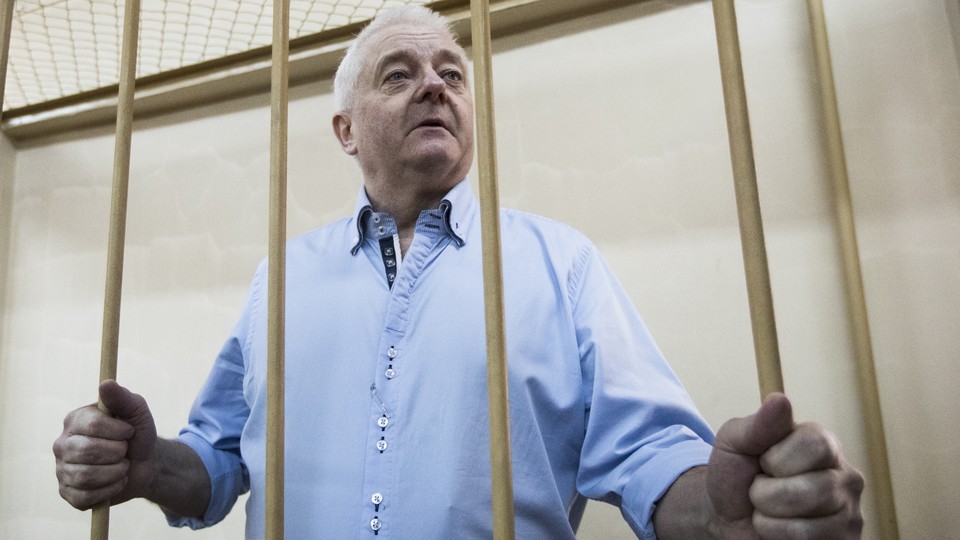 Frode Berg holding jail cell bars