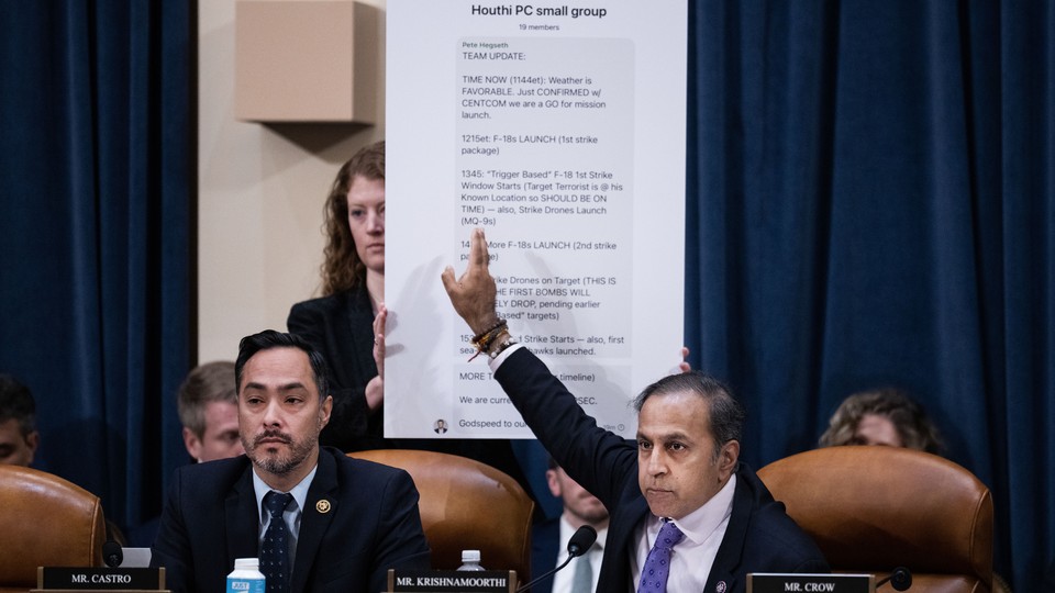 Rep. Raja Krishnamoorthi, D-Ill., references a copy of the Signal chat, about attacks against Houthis in Yemen, that accidentally included a reporter, while questioning witnesses during the House Select Intelligence Committee hearing titled "Worldwide Threats Assessment"