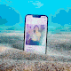 GIF of an iPhone sitting on sand underwater, scrolling through Hinge profiles.