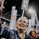 An elderly white woman looking ecstatic at the Democratic National Convention