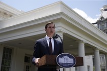 Jared Kushner speaks to reporters gathered outside of the White House.