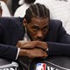Kawhi Leonard watches from the sidelines at the 2017 Western Conference Finals