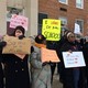 Protesters gather outside D.C.'s Jefferson Middle School on Friday, Feb. 10, 2017, where Education Secretary Betsy DeVos was scheduled to appear.