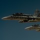Two U.S. Marine Corps F-18 Super Hornets depart after receiving fuel from a 908th Expeditionary Air Refueling Squadron KC-10 Extender during a flight in support of Operation Inherent Resolve on May 31, 2017.