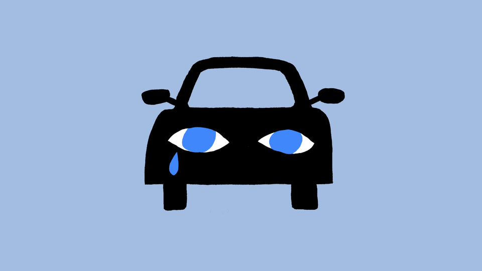 the front of a car with crying eyes for headlights