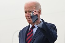 Joe Biden holding an iPhone