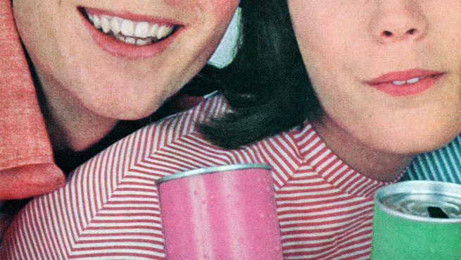 Vintage photograph of two young people smiling and holding colorful cans