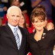 Still from the film 'Game Change', with Ed Harris (left) saluting as John McCain and Julianne Moore as Sarah Palin (right)