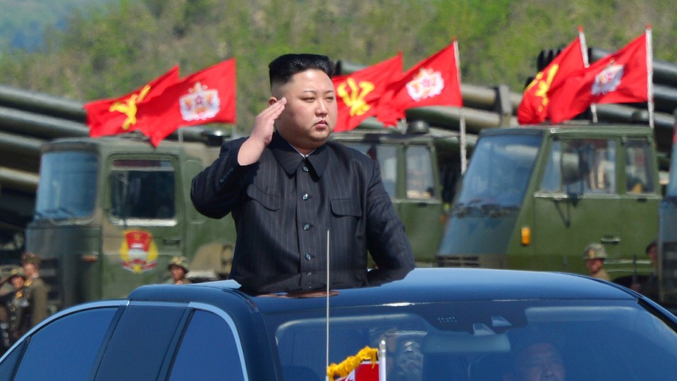North Korea's leader Kim Jong Un watches a military drill.