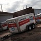 U-Haul moving trailers sit in a parking lot in Biloxi, Mississippi.