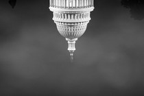 An upside-down image of the U.S. Capitol