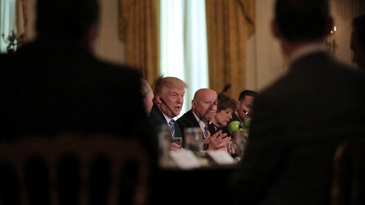President Trump meets with the House Republican deputy whip team at the White House on Tuesday.