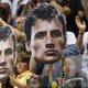 Fans at the 2012 London Olympics hold cutouts of U.S. Olympic swimmer Ryan Lochte.