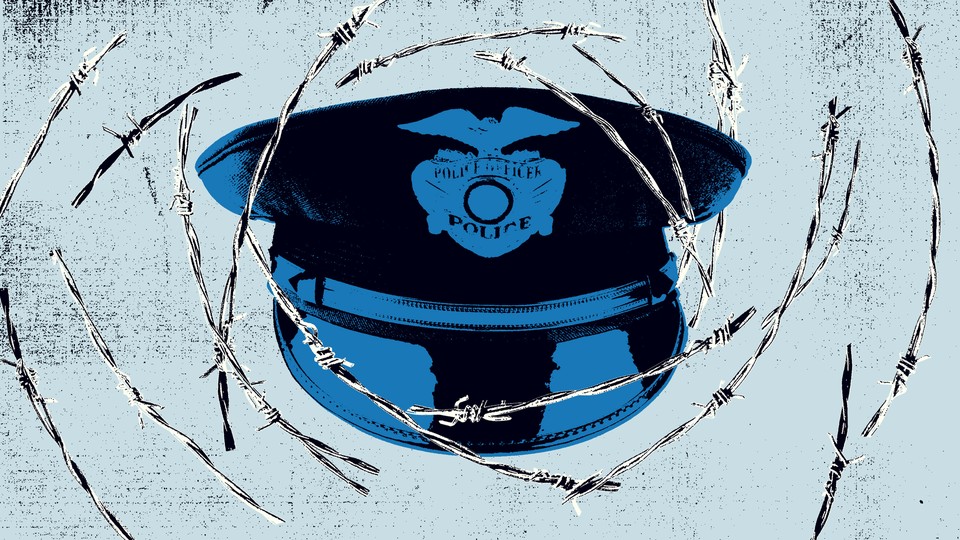 a police hat surrounded by barbed wire