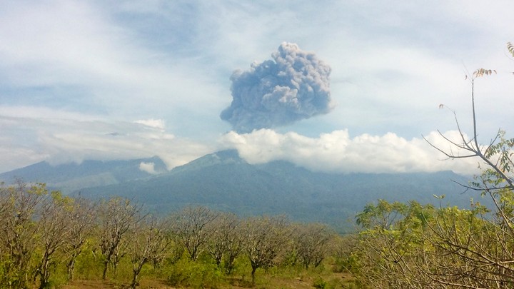 Mount Barujari, located inside Mount Rinjani volcano, is seen erupting from Bayan district, North Lombok, Indonesia, on September 27, 2016.