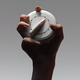 A hand holds a timer