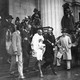 Gandhi leaves a meeting in London in 1931.