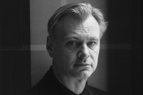 A black-and-white image of Christopher Nolan