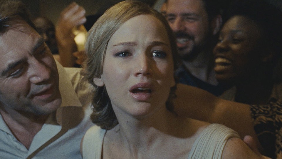 A still from Mother in which Jennifer Lawrence looks out in anguish from a crowd of people