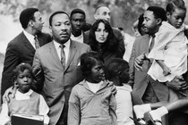 King and Joan Baez escorting children