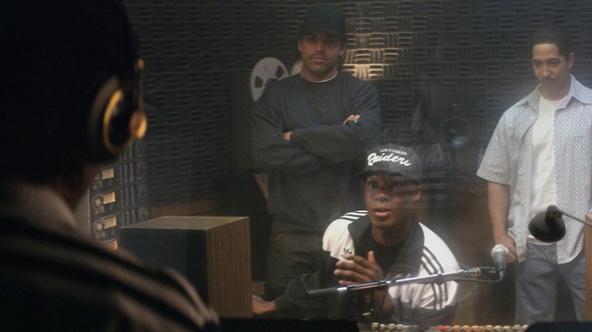 Four men in a recording studio in 'Straight Outta Compton'