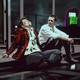 scene of Tyler Durden and the Narrator from "Fight Club" sitting on a curb