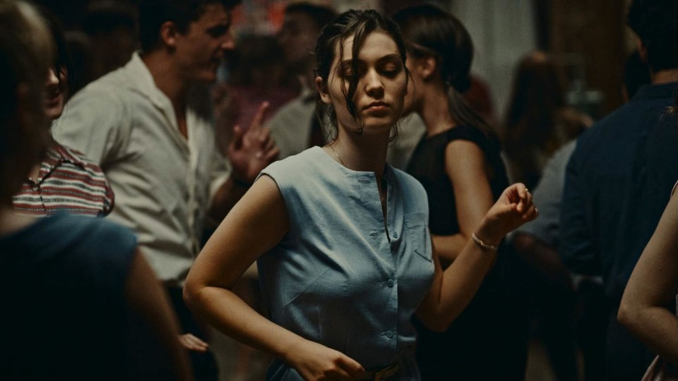 A woman dances at a party in the film "Happening."
