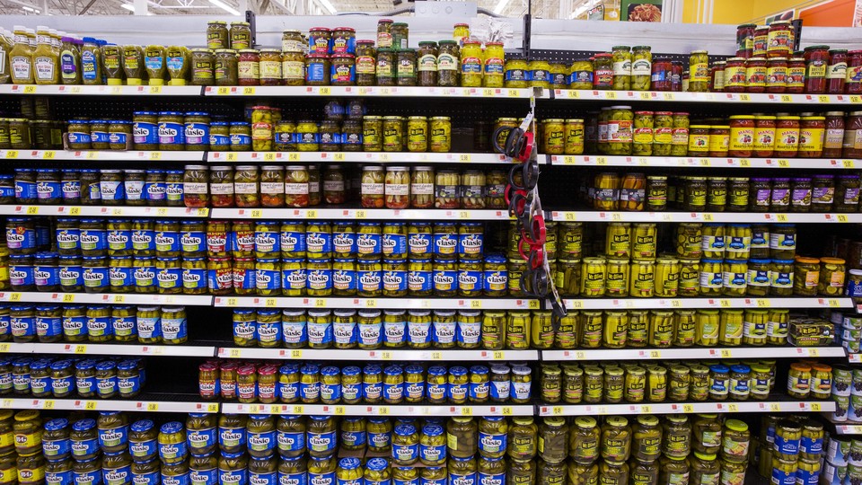 Different brands of pickles are displayed at a Walmart store in Secaucus, New Jersey